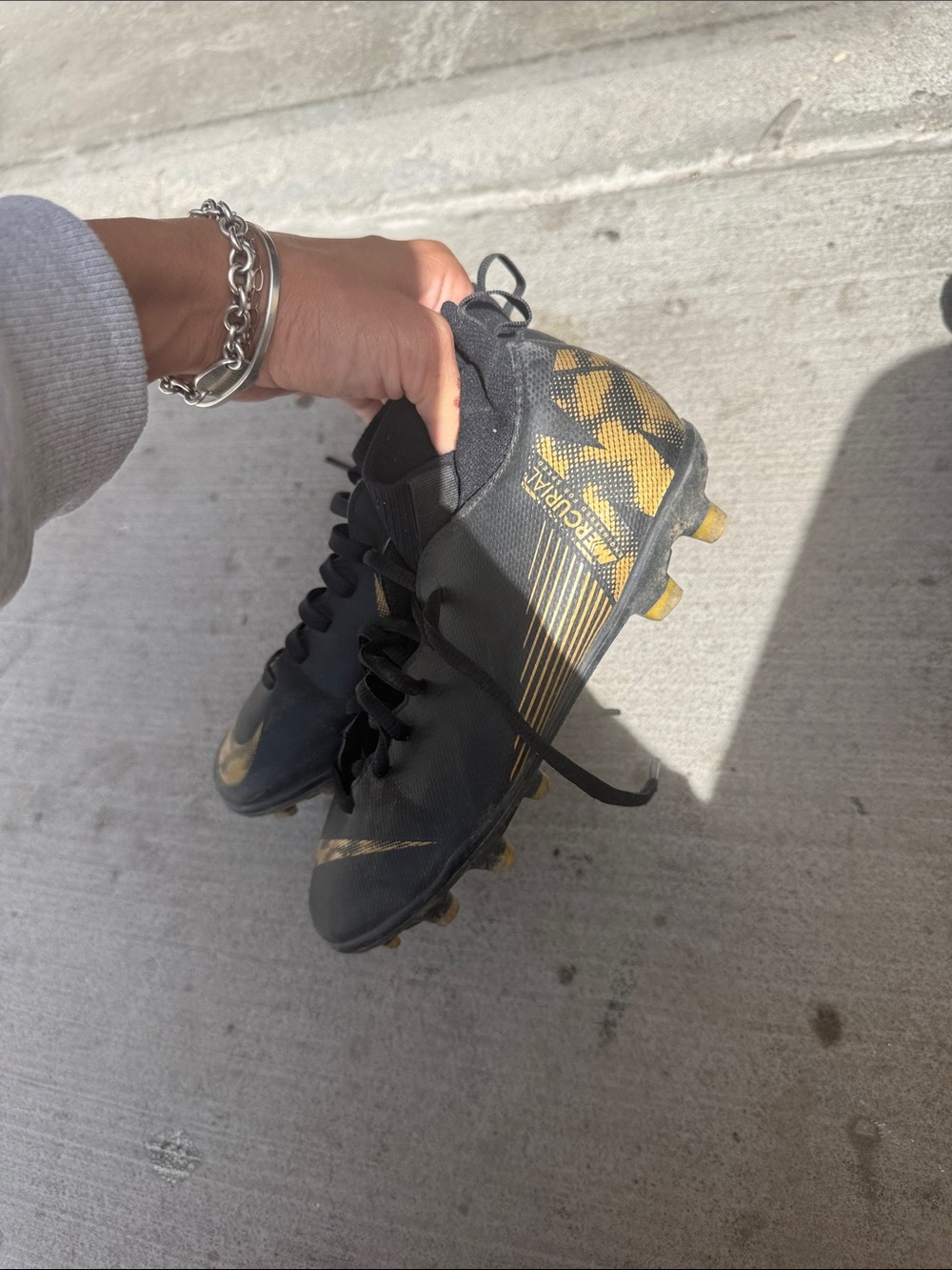 Nike Black & Gold Football Cleats — Vapor-Style Design